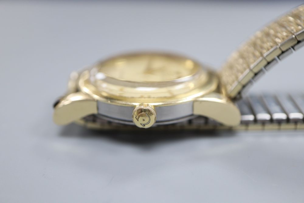 A gentlemans steel and gold plated Omega Automatic Chronometer Seamaster wrist watch, on associated bracelet,